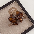 Elegant amber tortoiseshell acetate bow hair claw clip for a sophisticated retro look - 7.5cm / Brown