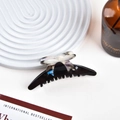 Pinza de pelo grande negra con adorno de mariposa en acetato con efecto mármol - Grande / Negro