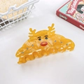 Detailed view of yellow reindeer hair claw clip featuring sparkling white rhinestones - Yellow Corn Elk Style