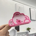 Dettaglio della pinza per capelli in acetato rosa con simpatici orsetti e impronte - Orso Rosa