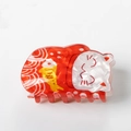 Dettaglio della molletta per capelli a gatto in acetato rosso con finitura perlata - Stile A (8.3cm)