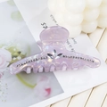 Detail of a purple pearlescent hair claw clip with elegant leaf-shaped rhinestones - 8.8cm / Light Purple