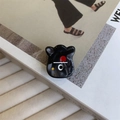 Close-up of a creative monster hair clip made of black acetate with colorful abstract patterns - Black