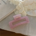 Detail of a large pink rectangular hollow hair claw clip with marble texture - Large Rectangular Soft Pink / 12.5CM
