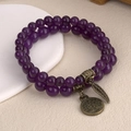 Bracelet double rang en perles violettes avec charms arbre de vie et feuille - Améthyste