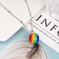Detailed macro view of vibrant rainbow striped sphere pendant with silver bead chain - Rainbow Ball Pendant Necklace (BNS-0428)