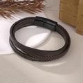 Close-up of multilayer braided leather bracelet with black magnetic clasp for men - Black
