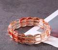 Apfelförmiges Perlenarmband aus orangefarbenem Phantomkristallglas mit Gummiband - Hellorange