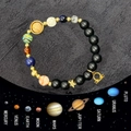 Dettaglio del bracciale in pietre naturali del sistema solare con ciondolo Bilancia oro - Bilancia