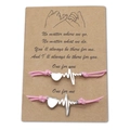 Pink cord couple bracelets set with magnetic heart and ECG charms on display card - Heartbeat Pink Rope