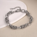 Detail of silver titanium steel chain bracelet with textured links and lobster clasp - Textured Square Basket Chain (BST-0144)