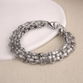 Detail of silver vertical texture cylindrical links on a heavy steel chain with lobster clasp - Square Grid Chain (BST-0144)