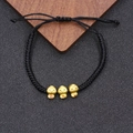 Handmade black woven rope bracelet featuring three gold rabbit charms with lucky patterns - 3 Lucky Snakes Style (BN-0226) / Black Rope