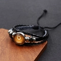 Mehrlagiges schwarzes Lederarmband mit Stier-Sternzeichen-Anhänger aus Glas - Stier / 18mm Schwarz