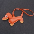 Handmade orange leather dachshund puppy bag charm with cute stitch details and strap - Bright Orange
