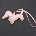 Pink and brown leather dachshund dog bag charm with detailed stitching and strap - Pink