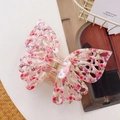 Detail of floral butterfly hair claw clip with hollow wings and gold metal spring - Floral Pink Purple / 14cm