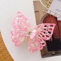 Detail shot of large butterfly hair claw clip with pink and white marble texture finish - Printed Pink / 14cm