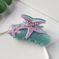 Macro detail of starfish hair claw clip with rhinestones and green glitter finish - Blue Pink 8.7cm