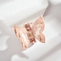 Macro view of butterfly hair claw clip with floral patterns on stone background - Medium Hair Claw / Soft Pink Butterfly Style