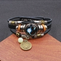 Bracciale Capricorno in pelle con ciondolo in bronzo antico e perla in vetro cielo stellato - Capricorno Luminoso