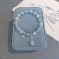 Bracciale di perle occhio di gatto blu con ciondolo a farfalla e piccoli ciondoli - Argento-Blu