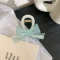 Detailed view of medium hair claw clip with light blue mesh bow and gold metal spring - 8.5cm / Creamy White With Green Bow