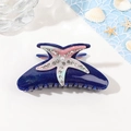 Pinza per capelli a stella marina con strass e perle su base acrilica blu glitterata - Blu Stellato (10.5cm)