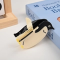 Pince à cheveux pingouin en acétate noir et blanc avec une finition brillante - Pince Manchot