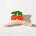 Detailed close-up of cream acrylic shark hair clip featuring red cherry and leaf patterns - Cherry Claw