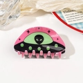Detail of creative UFO alien hair claw clip in pink and black acrylic with neon green accents - 8.5cm UFO Hair Claw - Black Pink