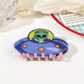 Détail d'une pince à cheveux OVNI en acrylique bleu foncé avec motif d'extraterrestre - Pince UFO 9cm - Violet Jaune