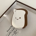 Nahaufnahme einer Toast-Schmuckschale aus Keramik mit einem minimalistischen Smiley-Gesicht - Cremeweiß Zwinkernder Toast / Weiße Brotscheibe