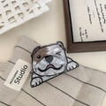Detail view of acrylic bulldog hair claw with marble texture on a lifestyle background - Bulldog
