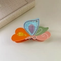 Nahaufnahme der bunten Schmetterlings-Haarklammer mit Strasssteinen und Acetat-Finish - 8.6cm / Orange-Blau