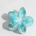 Detail view of blue lily hair claw clip with golden marble patterns on a white background - 8cm / Light Blue