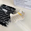 Detailed close-up of a dog-shaped acetate hair claw clip with cream striped texture - 8.3cm*5cm / White