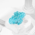 Blue marble Chinese knot hair claw clip in acetate displayed on a white stone pedestal - Sky Blue (QY0082)