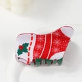 Détail de la pince à cheveux botte de Noël avec motifs de flocons de neige festifs - Chaussette de Noël Houx