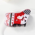 Gros plan détaillé sur une pince à cheveux de Noël en forme de chaussette du Père Noël - Style Père Noël (A款圣诞抓夹7.5cm)