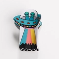 Detailansicht der kreativen Cartoon-UFO-Haarklammer mit bunter, glänzender Oberfläche - Cyan Gelb UFO (D)