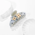 Detail of grey marble acetate hair claw with rhinestones and floral accents - Light Blue
