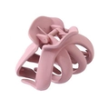 Close-up of matte pink octopus claw clip showing curved interlocking teeth design - Pink