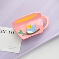 Detail of pink coffee cup hair claw with bird pattern and smooth resin texture finish - Pink Cup