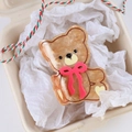 Cute brown acetate bear hair claw clip with pink bow in a gift box packaging - 8.5cm / Caramel color