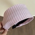 Detail view of the pink and white striped fabric texture on a wide-brimmed headband - Pink Striped Headband