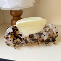 Macro detail of tortoiseshell acetate hair claw clip with multi-tooth design on a desk - 10.9cm / Brown-Yellow Floral