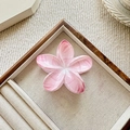 Detail of pink marble pattern plumeria hair claw clip on a linen display tray - Pink (Marble Texture)