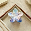 Detail showing floral claw clip with purple artistic print on linen jewelry tray - Cedar Gradient Print