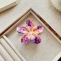 Detail of flower hair claw clip with purple marble texture on wooden display tray - Orange Purple (Marble Pattern)